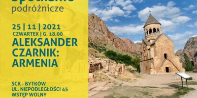 Plakat informujący, że najbliższe spotkanie podróżników poświecone będzie podrózy do Armenii. Na zdjęciu budowla sakralna