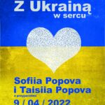 W tle kolory niebieski i żółty czyli barwy ukraińskiej flagi. Na pierwszym planie białe serce i info o występujących artystach